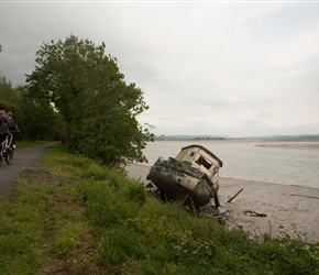 An abandoned boat has seen better days, but makes a good scenic backdrop