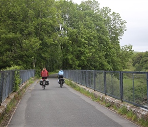 Cyclists enjoy the Tarka Trail near the Rolle Canal aqueduct