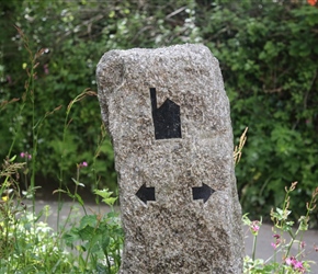 Another granite marker, this one, just with the arrows